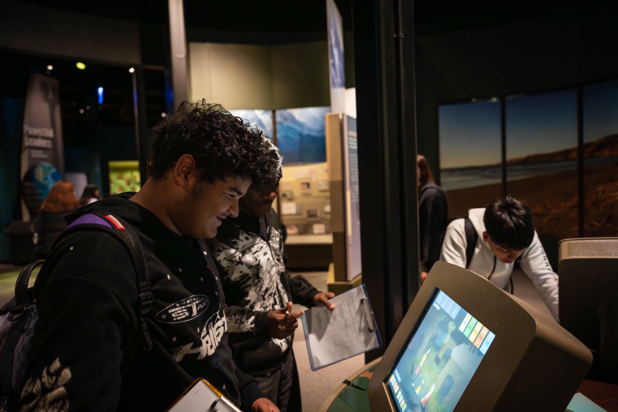 Orr Academy students exploring an interactive exhibit at the Field Museum